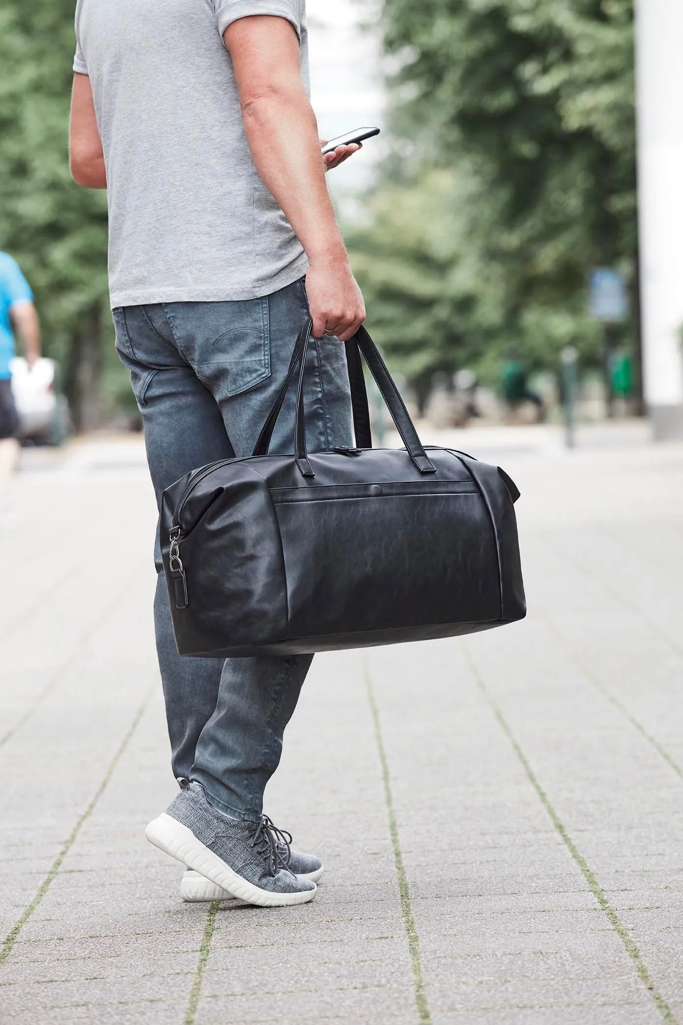 Borsone da viaggio  in 100% pelle sintetica, classico ed elegante