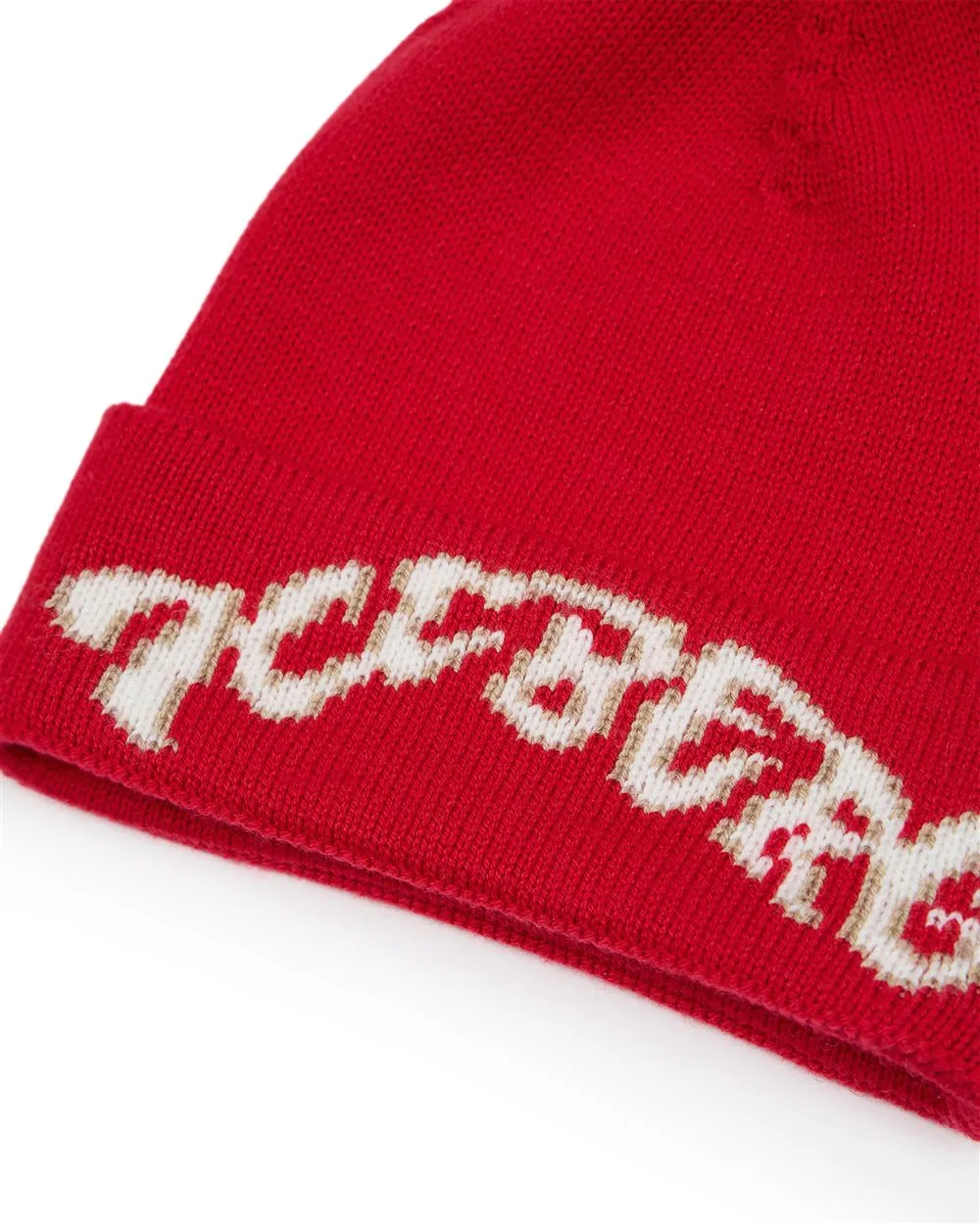 Cappello di lana rosso modello beanie con pon pon