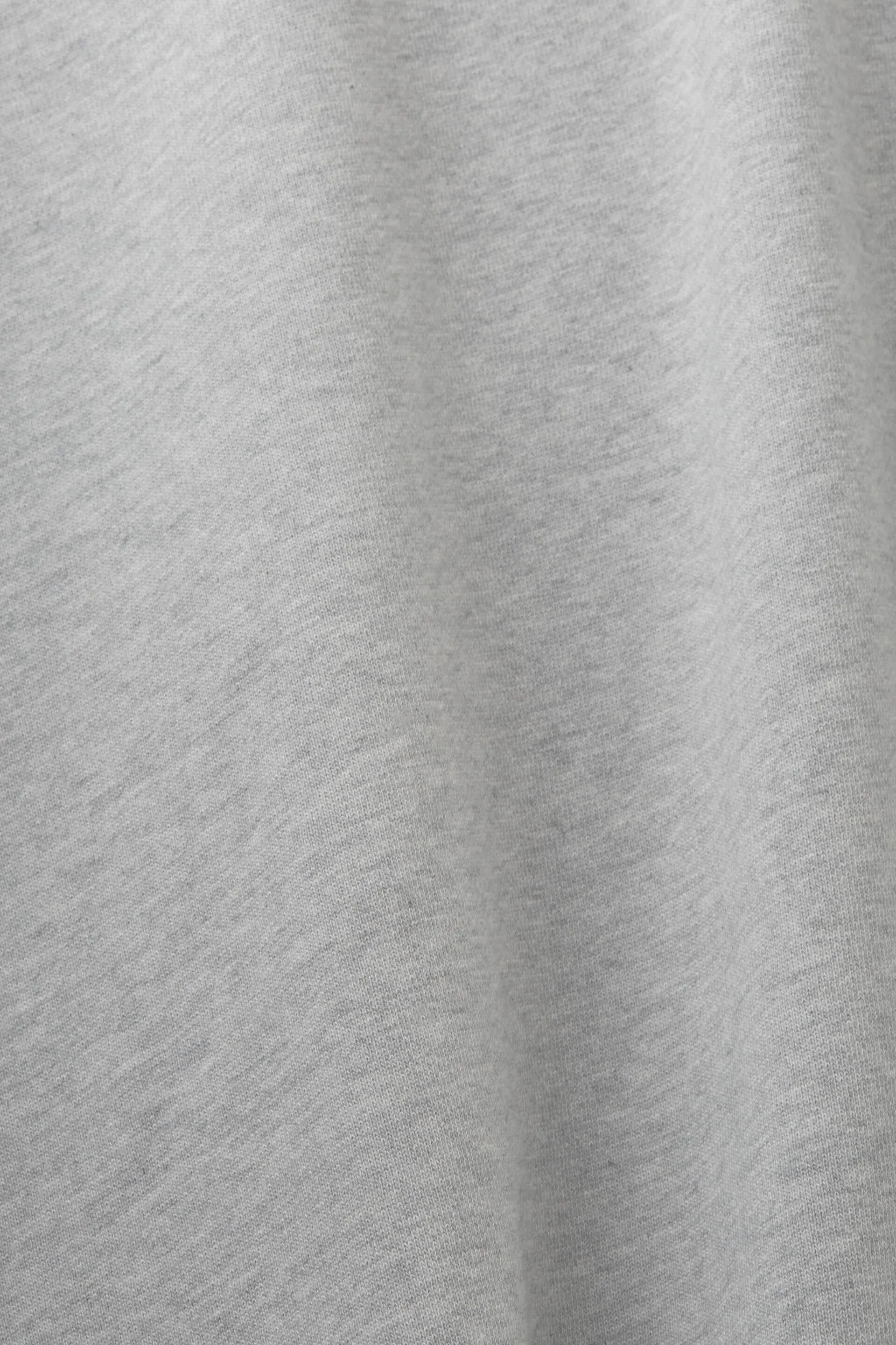 Felpa girocollo oversize con spacchetti sull’orlo