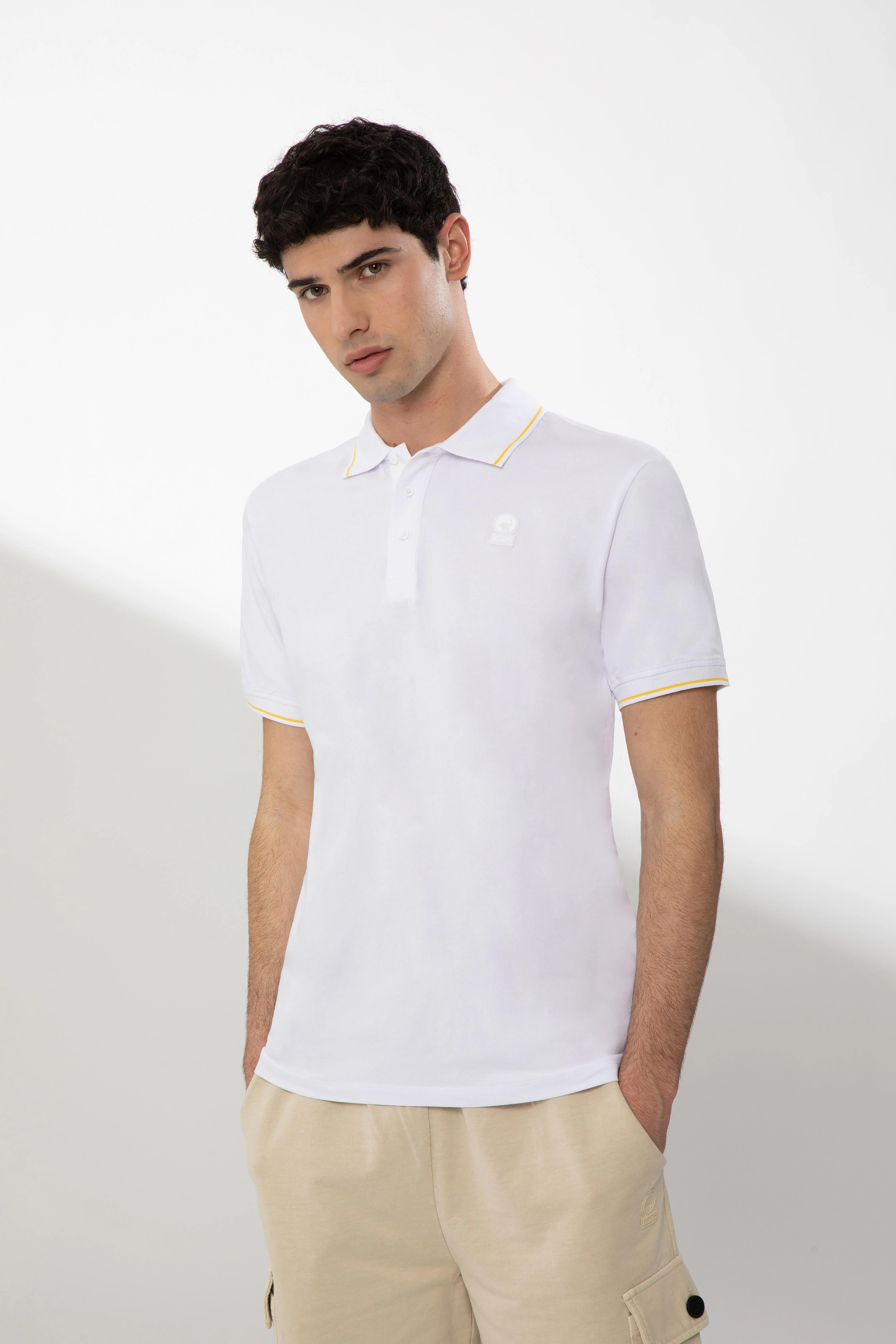 SAXON – Polo bianca in cotone stretch