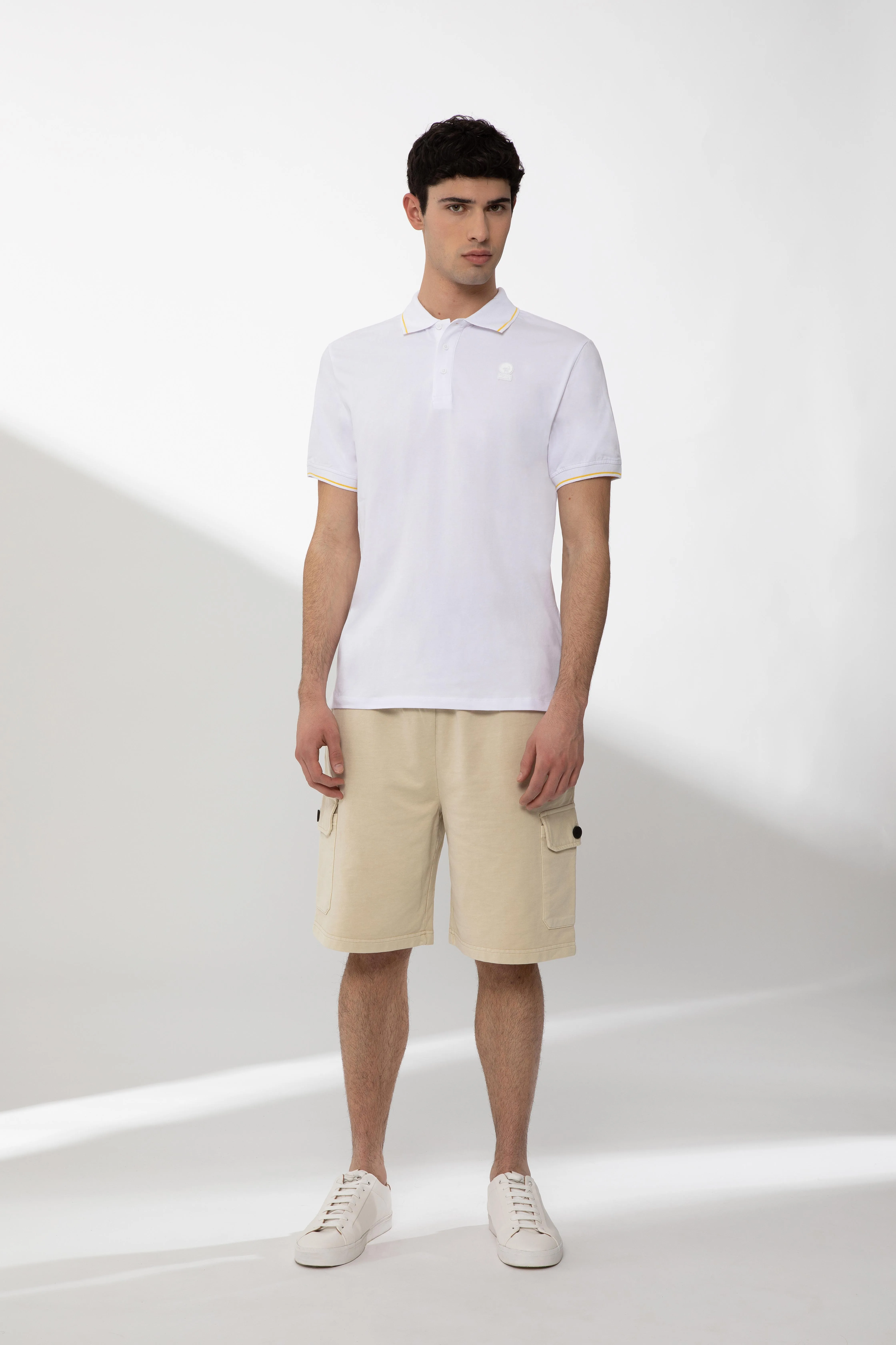 SAXON – Polo bianca in cotone stretch