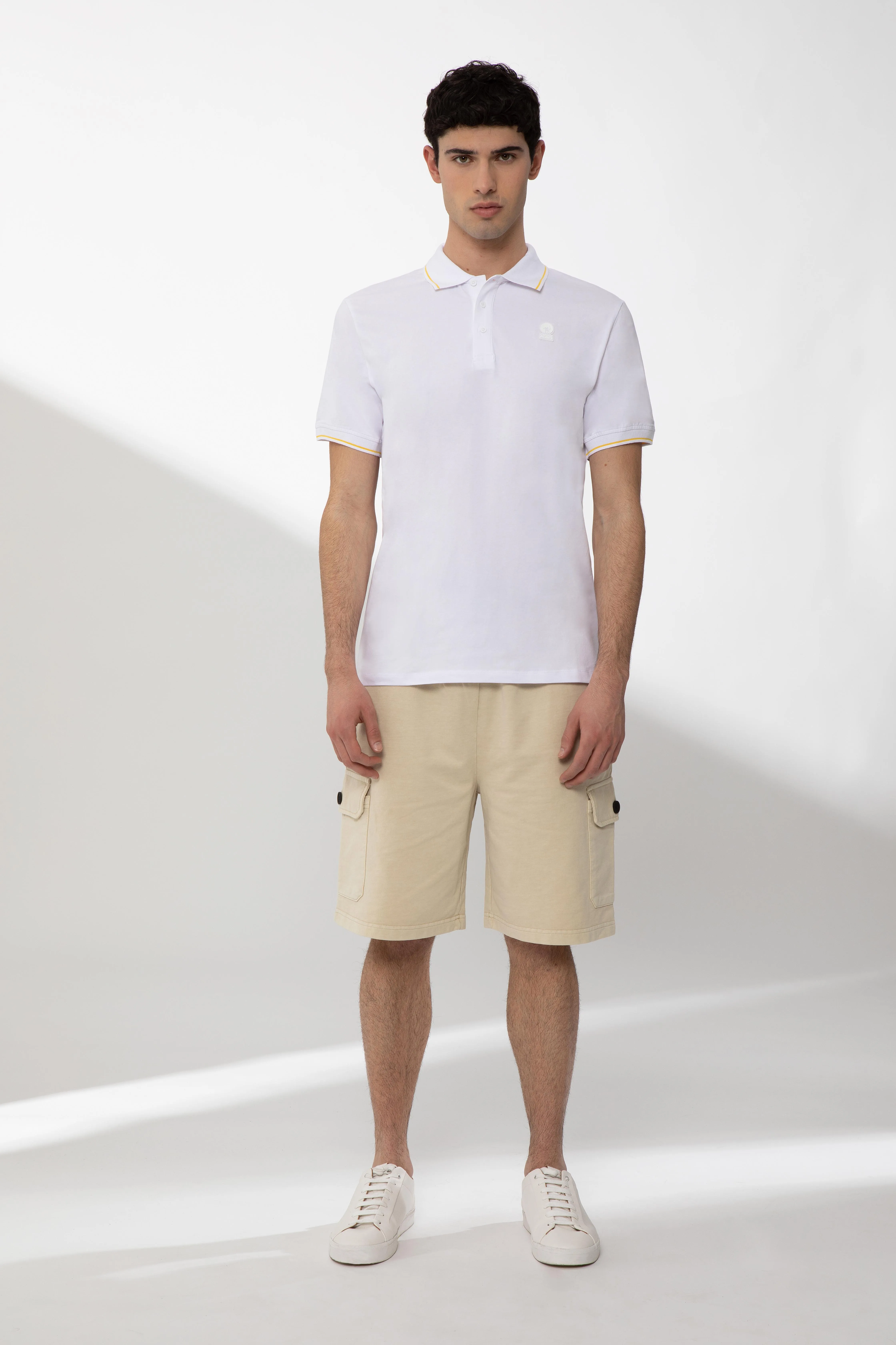 SAXON – Polo bianca in cotone stretch